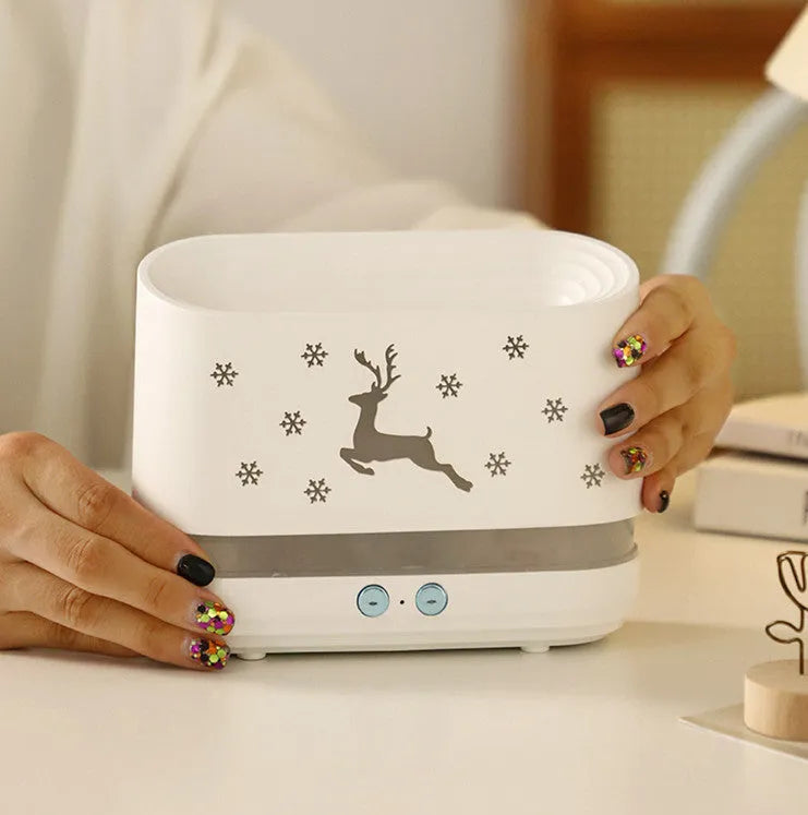 White Elk Flame humidifier diffuser with Christmas pattern and glowing adjustable flame effect.