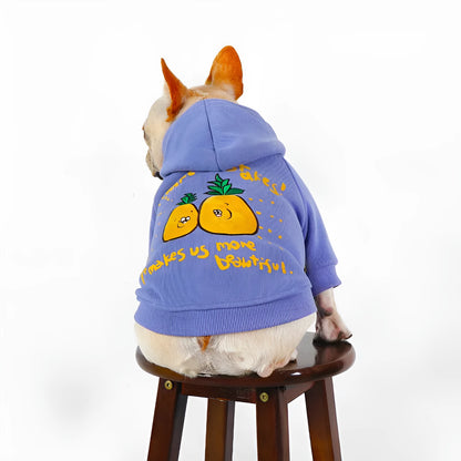 Blue and purple cartoon printed cotton hoodie for pets on a dog or cat, showing the plush design and hood.