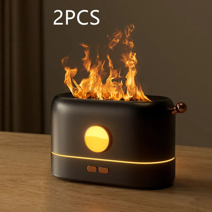Black USB flame humidifier diffuser with 200ml tank on desktop showing simulation flame effect