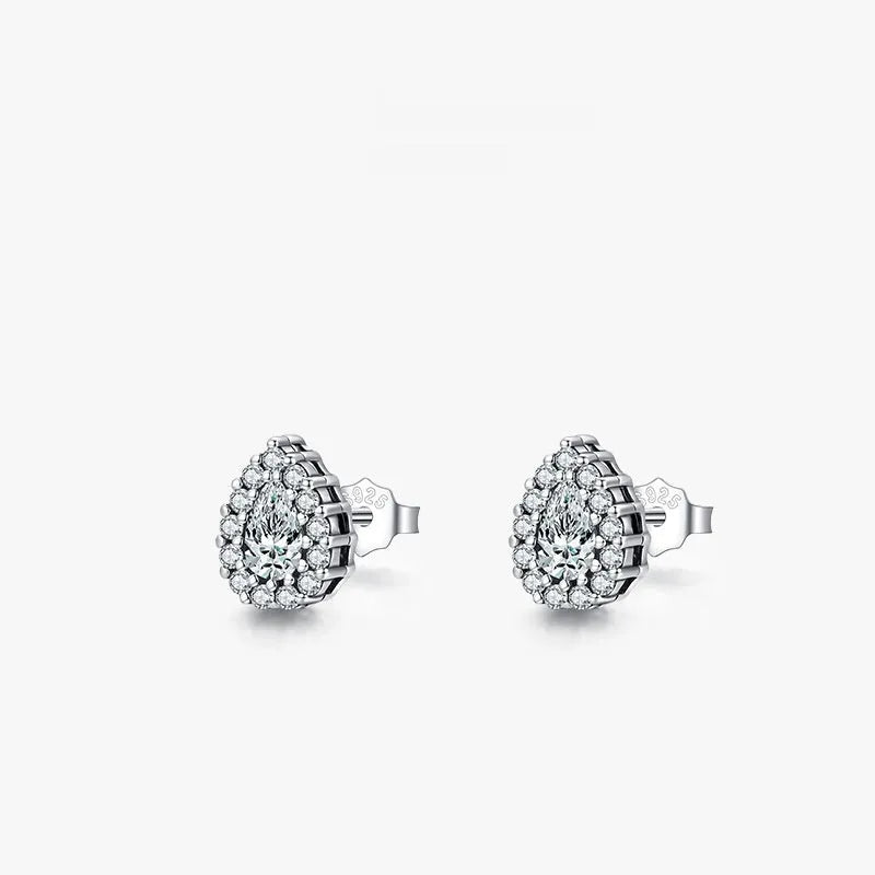 A pair of women's silver drop-shaped ear studs with a polished finish on a white background.