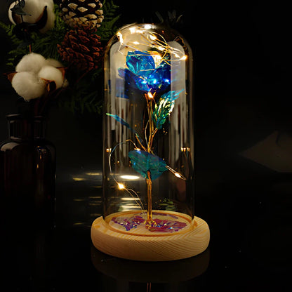 Little Prince rose arrangement under 20x9cm glass dome with gold foil flowers