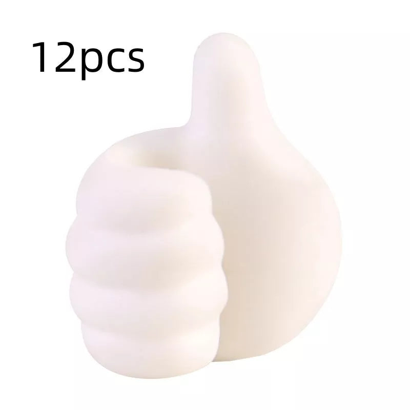 Silicone thumb wall hooks in various colors for organizing kitchen and bathroom items