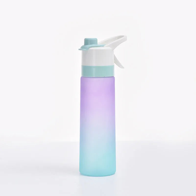 Large plastic spray water bottle with handle strap and leakproof lid in green colour.