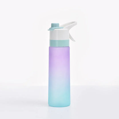 Large plastic spray water bottle with handle strap and leakproof lid in green colour.