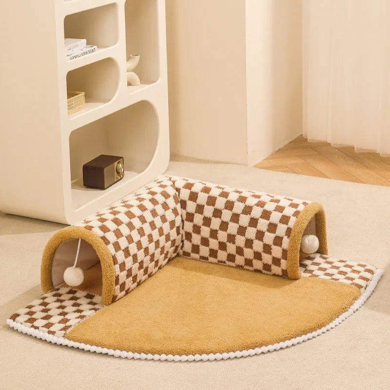 Plush plaid cat tunnel bed with central mat showing brown colour and collapsible tunnel design