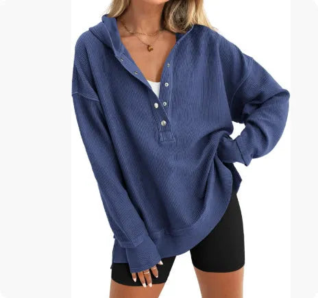 Women's loose raglan sleeve sweater in peacock green colour, showing long sleeves and casual pullover style