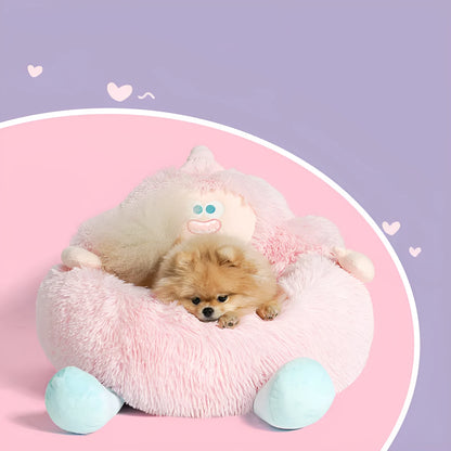Grey plush donut-shaped pet nest bed with raised edges for a cat or dog.