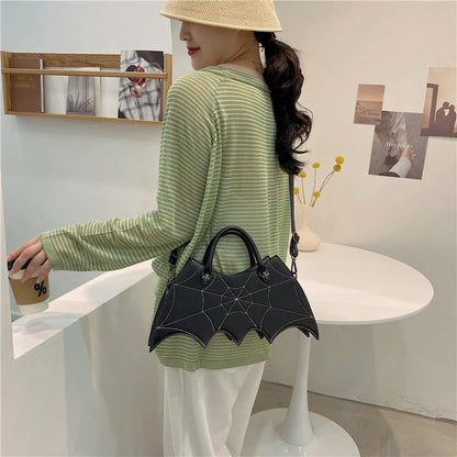 Stylish Halloween spider web crossbody bag in various colors, including black, white, brown, pink, and purple