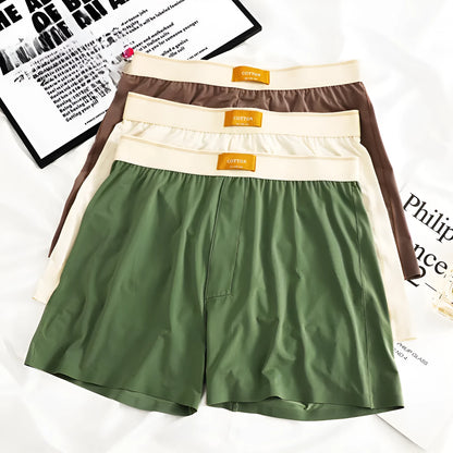 Men's loose-fit Ice Silk nylon underwear in a three-pack, showing colour options like black, green, and grey.