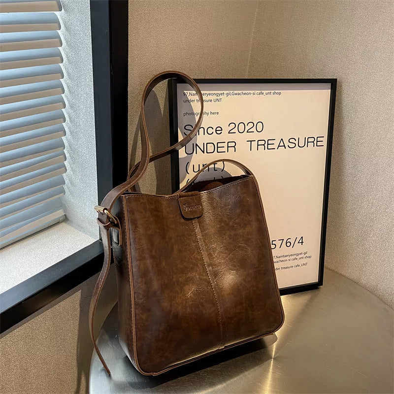 Large-capacity PU women's cross-body bag in coffee color, khaki, brown, and black