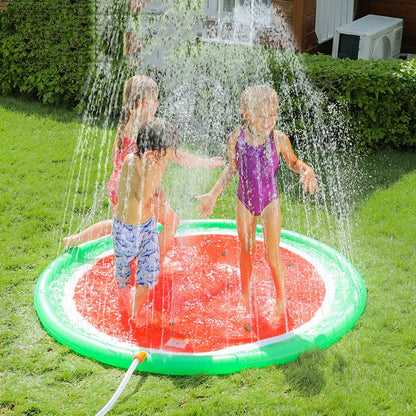 Children playing on a vibrant watermelon design water spray mat outdoors