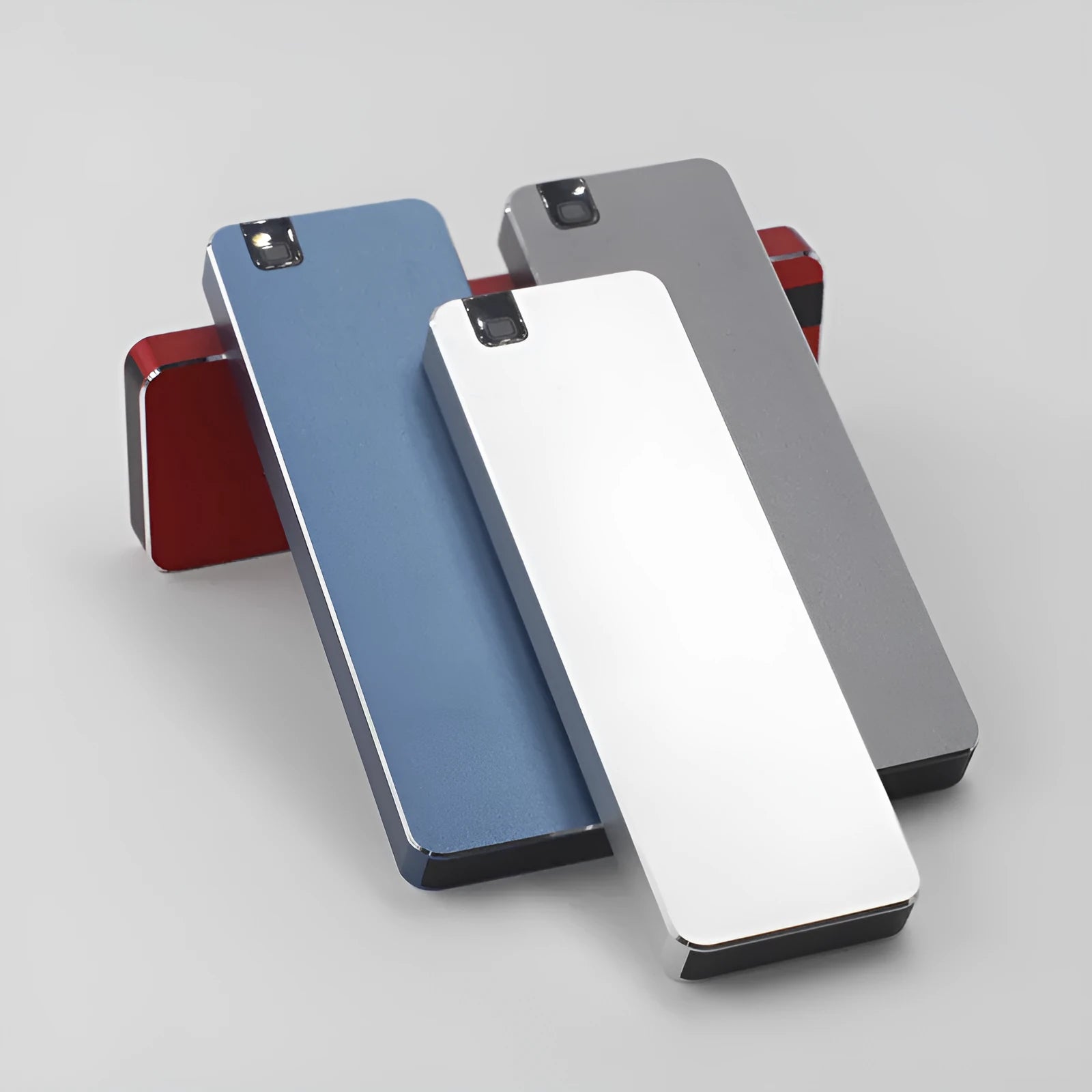 Compact metal-shell mobile hard disk with USB 3.1 connector, shown alongside a USB cable and protective cover.