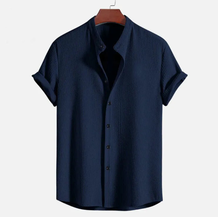 Men's loose short sleeve shirt in polyester, available in colours like wine red and navy blue, sizes S to 4XL