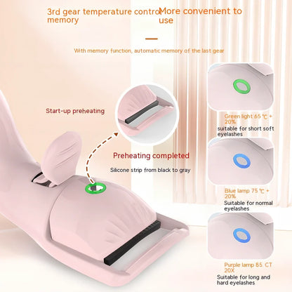 Pink and white electric eyelash curler with USB charging cable and temperature control buttons