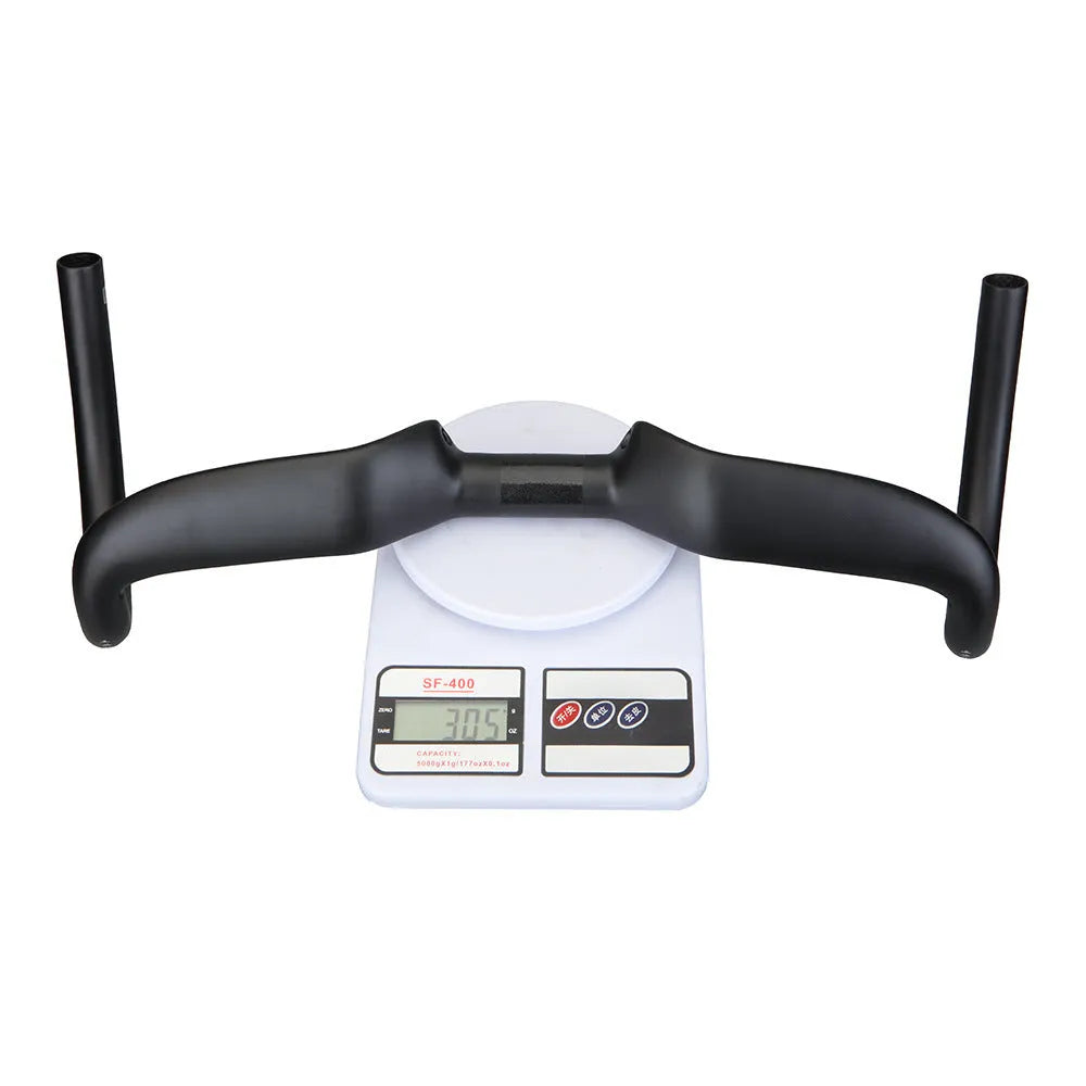 Black carbon fibre road bicycle handlebar showing large-angle outer sweep and 31.8mm clamp area.