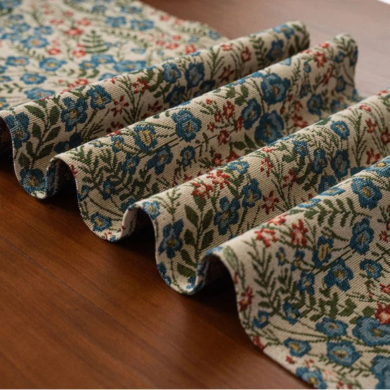 Dark blue jacquard stripe table flag with tassel trim, 32cm wide, showing textured weave pattern
