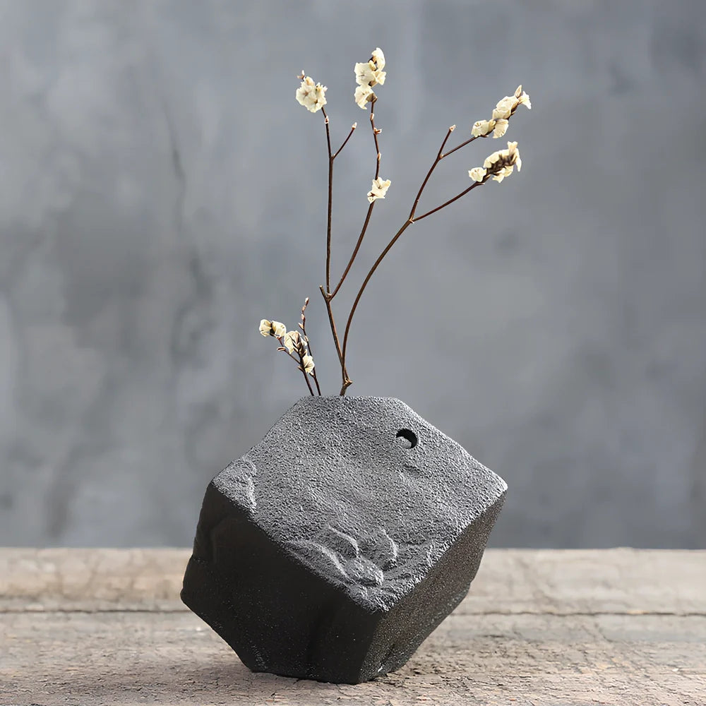 Handmade stoneware Zen Chinese flower arrangement vase with floating lotus device on wooden table