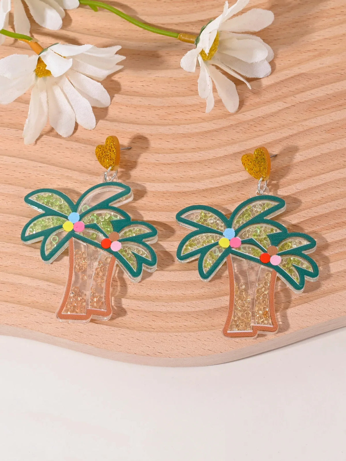Colourful acrylic earrings with fruit and dessert designs including cherry, strawberry, watermelon, pineapple, coconut, cake and ice cream motifs