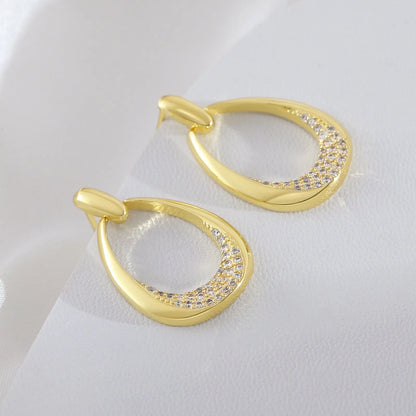 Women's yellow gold geometric drop earrings with zircon detailing measuring 2.6 by 1.7 centimetres