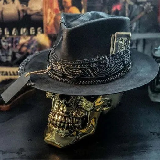 Handmade wool felt skull hat with conical crown design, showing textured surface and distinctive silhouette