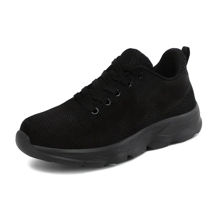 Women's black sneakers with mesh upper, wedge heel, and lace-up front