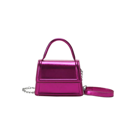 Retro style square PU leather crossbody bag in multiple colours on a model.