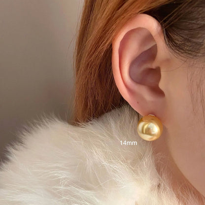 Large pearl stud earrings with geometric retro design and star elements in silver