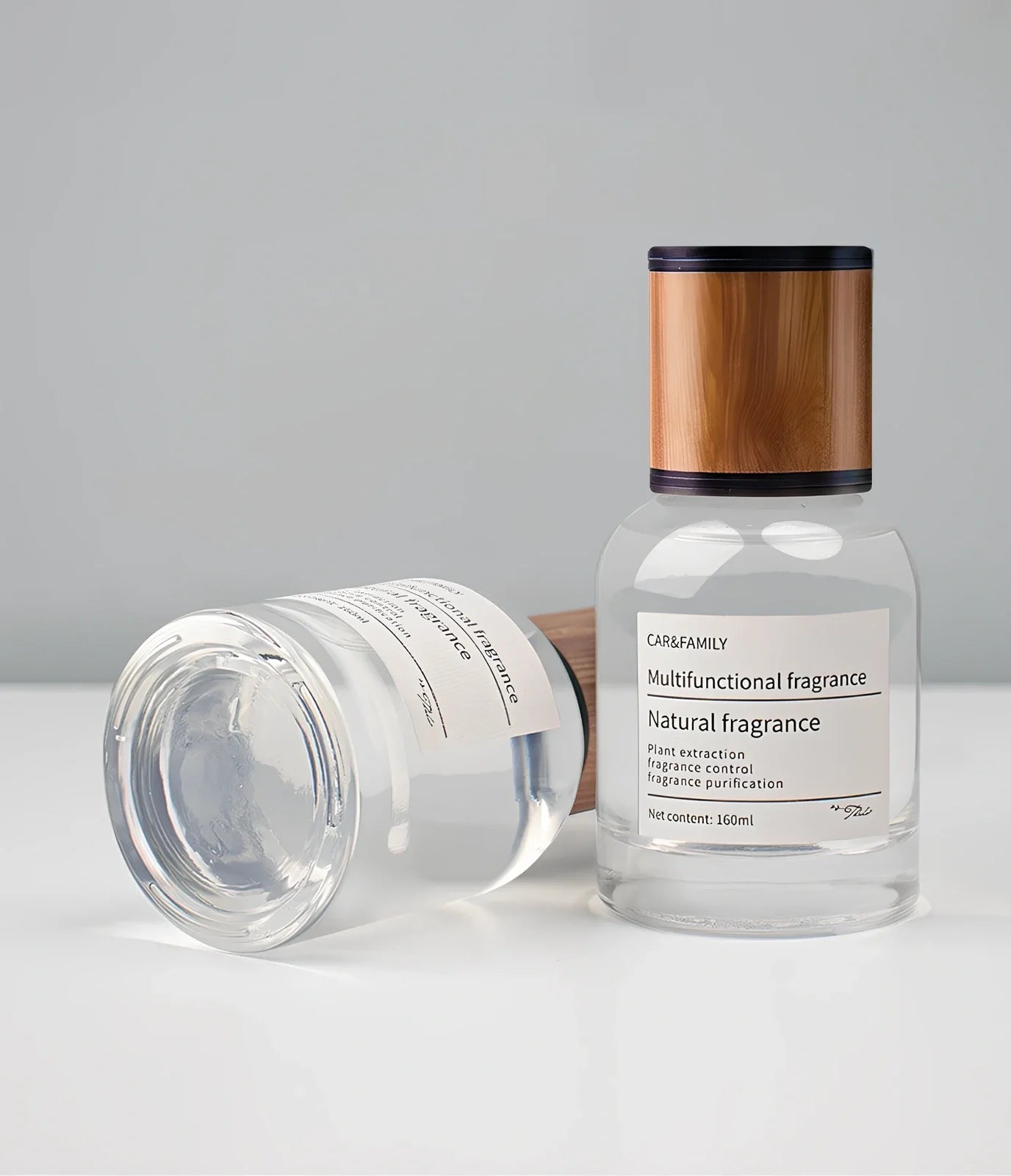 Car mounted fragrance perfume with 120mm round glass bottle on car air vent