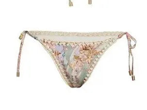 Women's creamy-white floral bikini set with detachable skirt for beach and pool use
