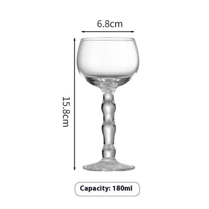 Medieval French design red wine glass with bamboo-inspired stem and wide bowl for wine aeration