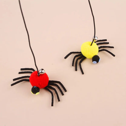 Cat toy hanging from door with elastic rope, colourful feather, bell and soft spider decoration