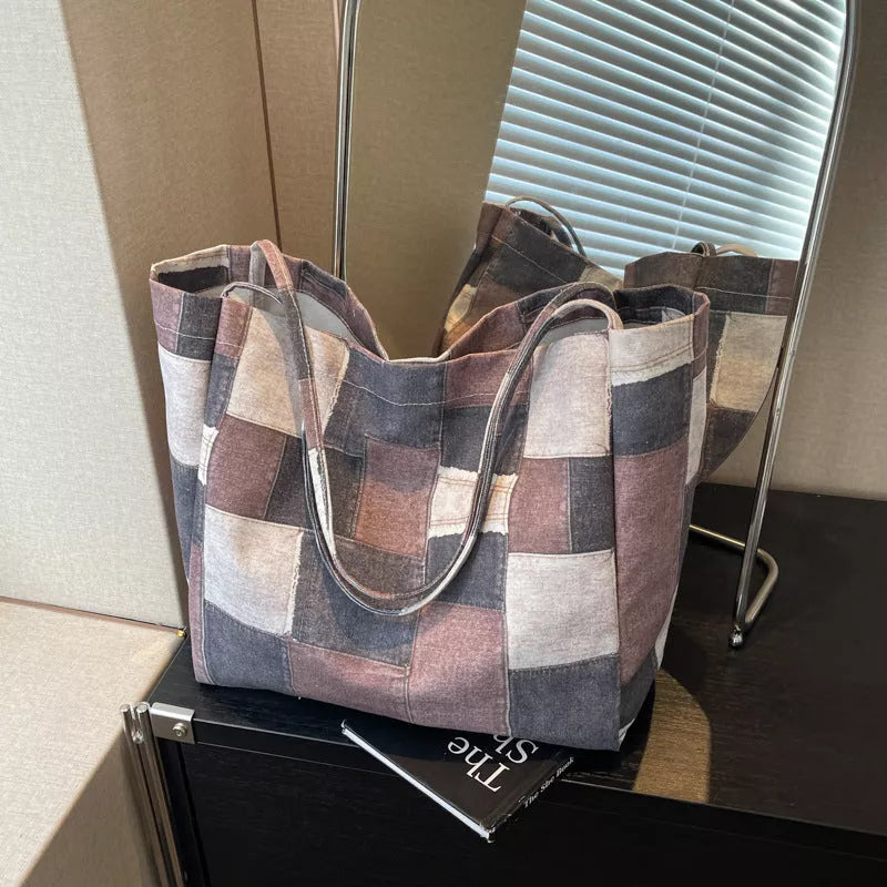 Women's denim tote bag with color-contrast check design for commute and leisure