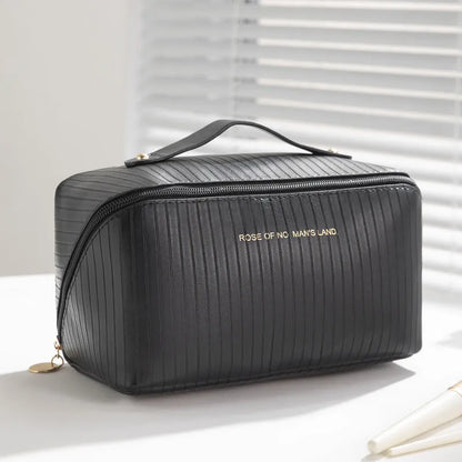 Vertical pattern pillow makeup bag with cubic 22.5x12.5x12.5cm dimensions in beige, black, brown, grey or pink