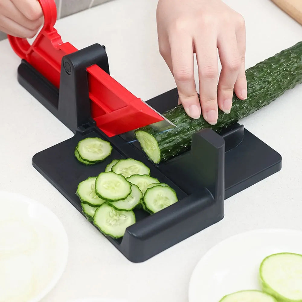 Green and red vegetable cutter with stainless steel blades for carrots and potatoes
