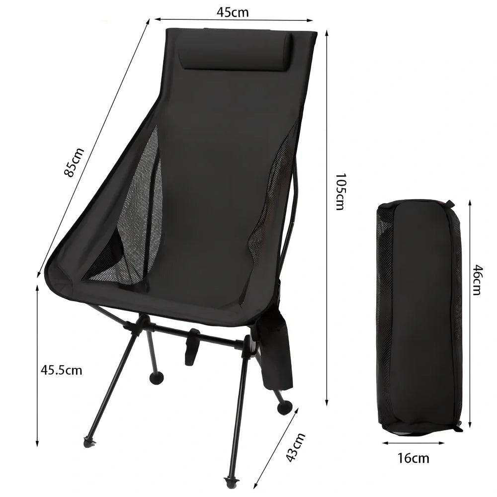 Army green outdoor folding chair with adjustable backrest and legs in reclined position on grass