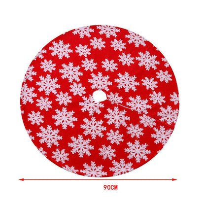 Elegant Christmas tree skirt with plush snowflake design, creating a cozy and festive holiday atmosphere.