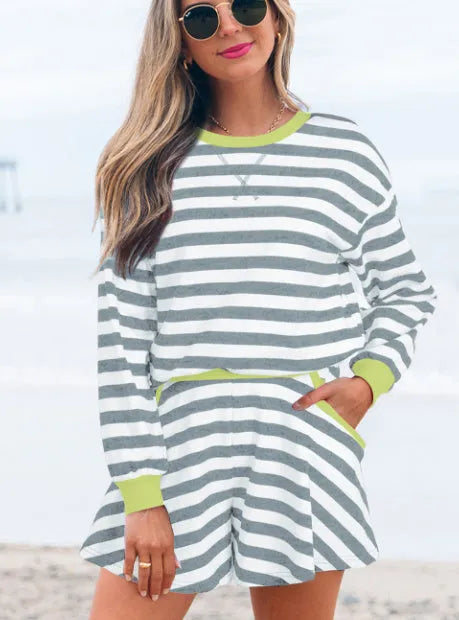 Women's black stripe blouse and skirt set with contrast ribbed banding detail
