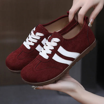 Women's vintage canvas sneakers in dark red with round toe and flat rubber sole