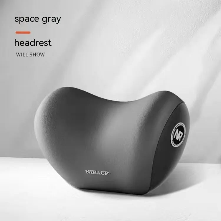 Black automotive headrest pillow and lumbar support pillow set with memory foam filler on a car seat