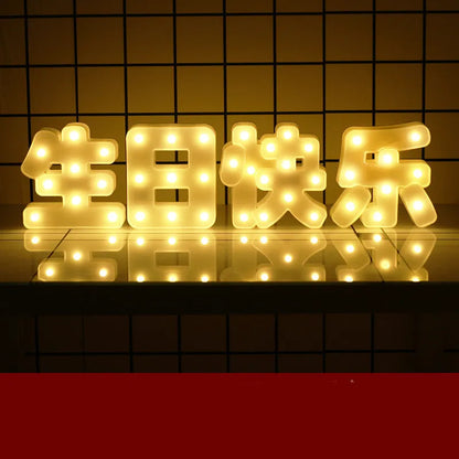 Plastic LED alphabet letter light spelling a message for a birthday or proposal.