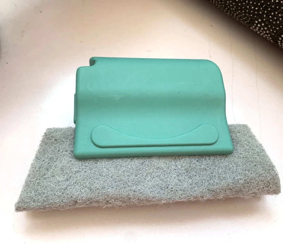 Window groove cleaning brush with comfortable grip and scouring pad head