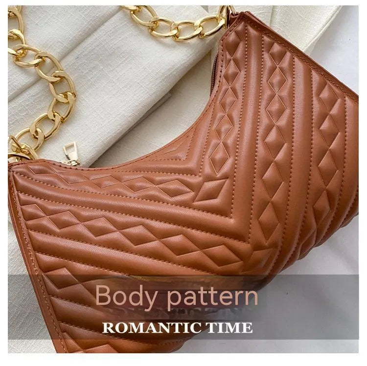 Brown pleated chain baguette shoulder underarm bag with adjustable strap and soft carry handle