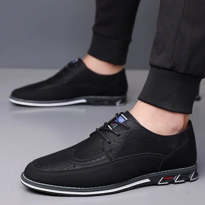 Men's black leather casual shoes with a leather toe cap and rubber sole on a white background.