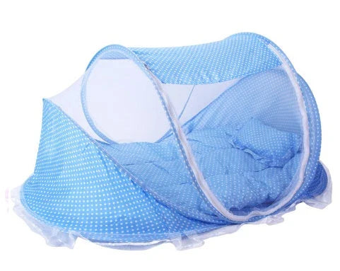 Portable foldable baby bed net with built-in mattress and pillows, perfect for travel and outdoor activities