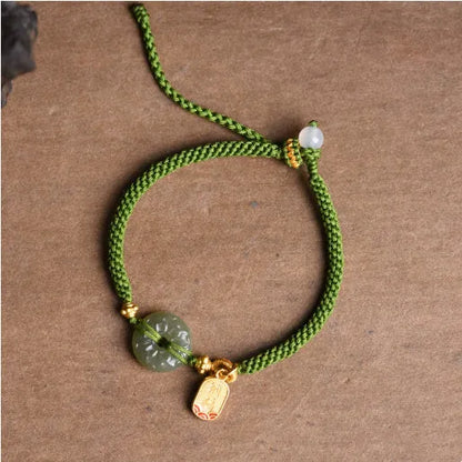 Women's corn knot Hetian jade safety buckle bracelet with hand-woven flexible wire and green rope design