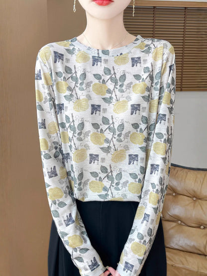 Round neck floral print pullover shirt in Tencel cotton blend fabric on hanger