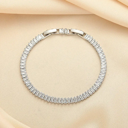 Rectangular geometric brass bracelet with inlaid zircon stones in champagne gold or silver colour