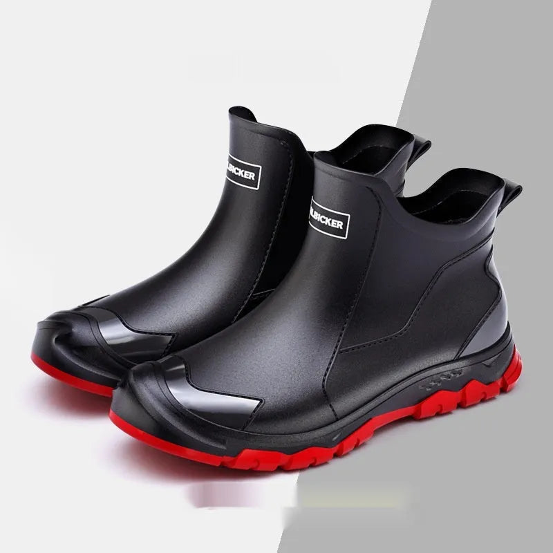 Low-cut solid colour PVC rain boot with round toe and plastic sole.