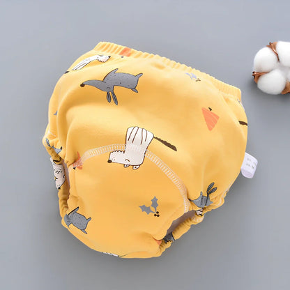 Washable baby training pants with 6-layer gauze construction in assorted patterns including animals and geometric designs