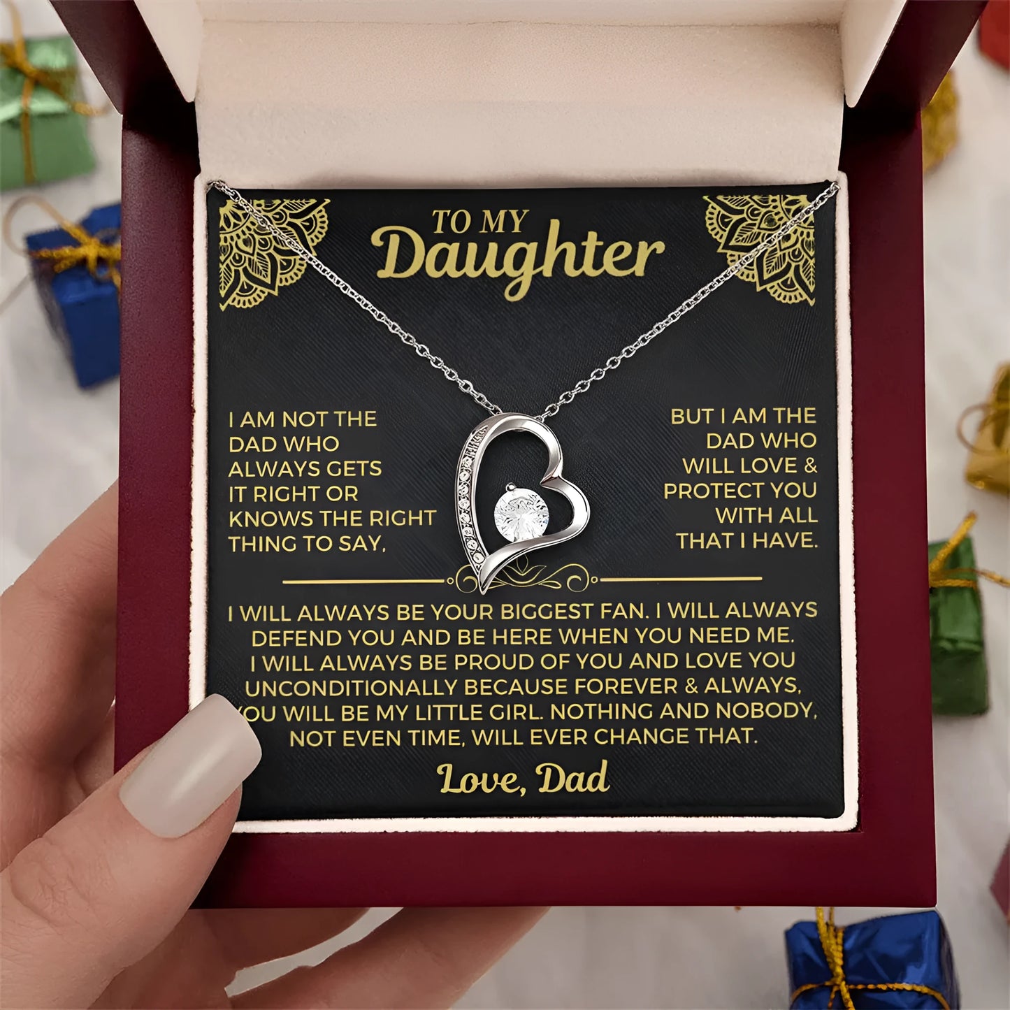 Silver hollow openwork heart pendant necklace presented in a gift box with a card.